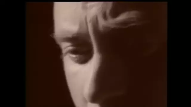 Phil Collins - Another Day In Paradise (Official Music Video)